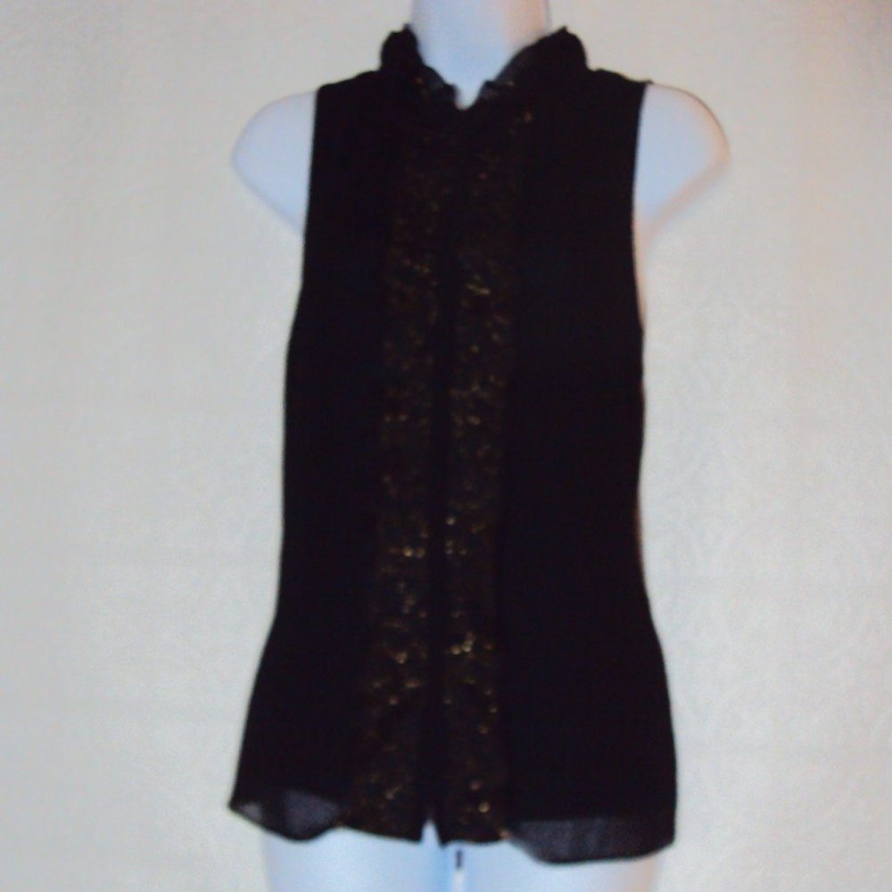 J. Lo Gold embellished black blouse.